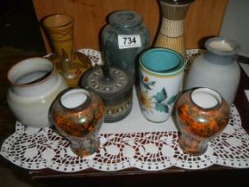 A mixed lot of ceramic vases and pots.