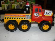 A toy Big Rig towing truck.
