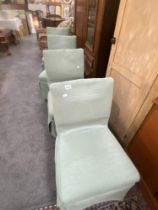 A set of 4 Mid 20th century oak frame dining chairs with later covers