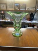 An art deco green glass vase with mermaid stand decoration