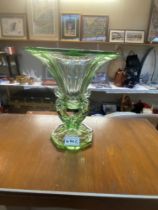 An art deco green glass vase with mermaid stand decoration