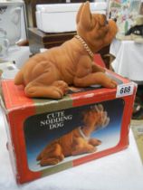 A vintage boxed 'Cute Nodding Dog'.