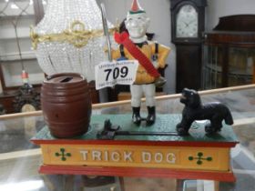 A 'Trick Dog' mechanical money bank.