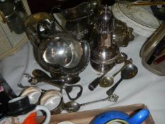 A mixed lot including sugar sifter, sugar scuttle, napkin rings etc.,