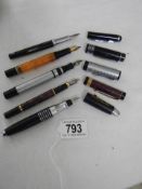 Five vintage fountain pens.