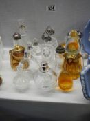 A mixed lot of perfume bottles etc.,