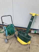 A Spreader & Hose on trolley