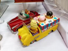 A vintage battery operated tin plate photoing on a car A/F & Ice cream van, untested