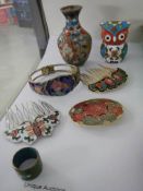 An enamel owl, vase, hair ornaments etc,.,