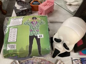 A Ghostface mask from The Scream films & The Riddler fancy dress costume in adult size