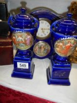 A ceramic clock garniture (one side piece a/f).