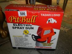 A boxed Pit Bull electric spray gun.