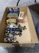 A quantity of boxed & loose Corgi racing cars