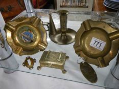A mixed lot of brassware including chamber candlestick, ashtrays etc.,