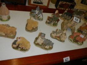 A quantity of cottages including Lilliput lane.