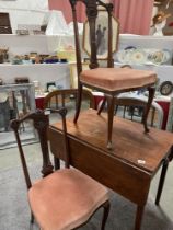 A pair of ornately carved hall chairs COLLECT ONLY