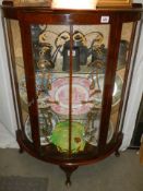 A bow fronted display cabinet, COLLECT ONLY.