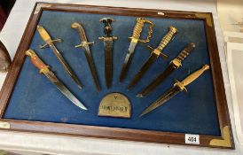 A framed collection of World War II Combat knives collection only