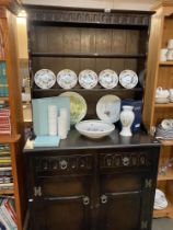 Small dark wooden dresser. Double doors with 2 doors to base