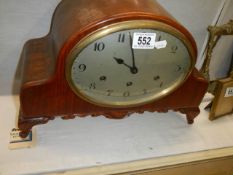 A vintage mantel clock.