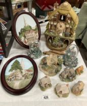 A Bradex clock, A quantity of Lilliput Lane cottages, 2 Wall plaques etc