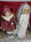 Two porcelain collector's dolls.