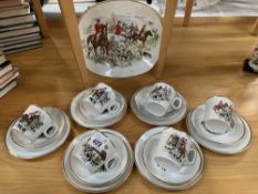 A 19 piece hostess tea set depicting a hunt
