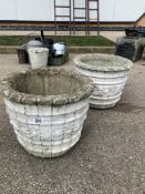 A pair of heavy round planters