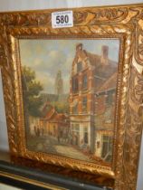 A Good gilt framed continental street scene signed H Torburg.