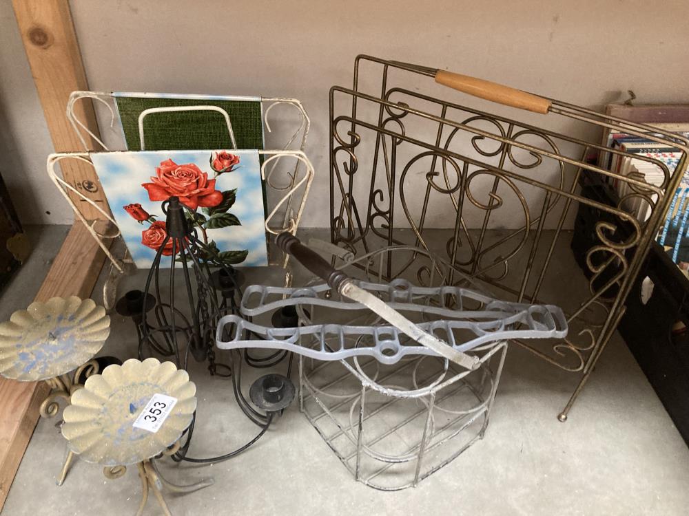 A good lot of metal items including Victorian style airer ends, candle holders & paper racks