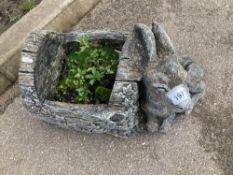 A Donkey & Trough planter made from concrete