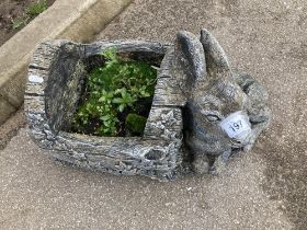 A Donkey & Trough planter made from concrete