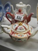 A Sadler teapot, a Royal Doulton teapot and a Chinese teapot.