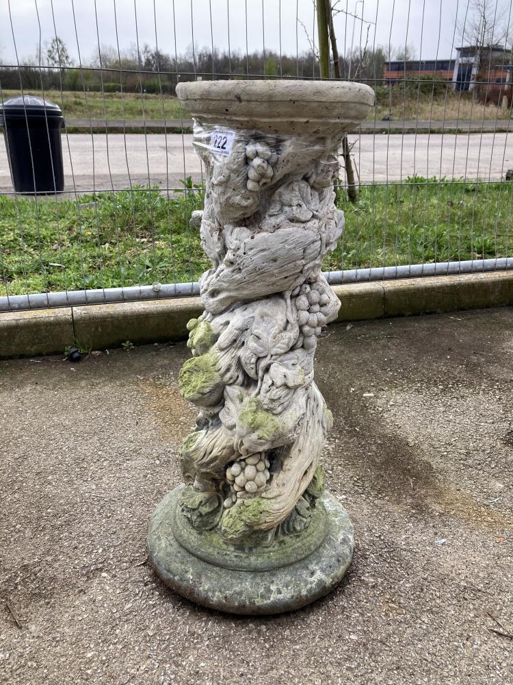 A heavy decorative plinth