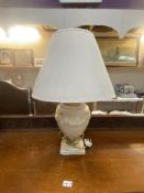 A large Greco-Roman style urn table lamp