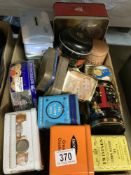 A box of vintage tins including tea Caddys