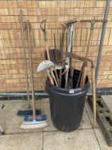 A quantity of garden tools & 3 brooms