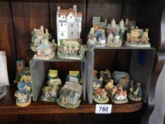 A collection of Lilliput Lane and other model cottages.