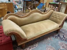 A Victorian salon settee with swan neck & scroll arms