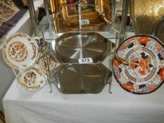 A Hors D'ouvre tray, a cake plate and a stainless steel two tier cake stand.