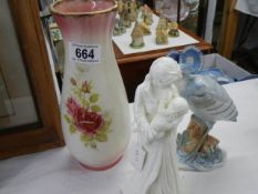 A Royal Worcester figure, an Ironstone vase and a bird figure.