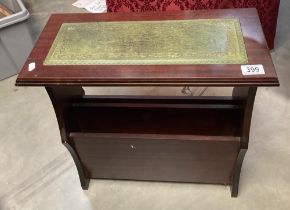 A Leather topped magazine rack/occasional table