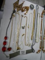 A mixed lot of necklaces and earrings.