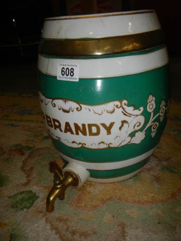 A ceramic brandy barrel (a/f cracked)