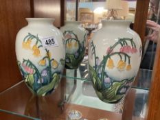 A pair of Tupton ware hand painted vases height 21cm