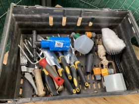 A box of gardening tools