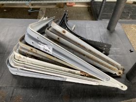 A quantity of metal shelf brackets