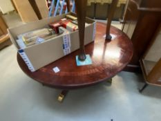 A dark wood 4 legged inlaid round coffee table (92cm Diameter)