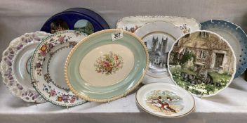 A quantity of decorative plates