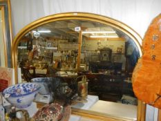 A gilt framed overmantel mirror. COLLECT ONLY